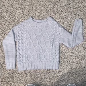 Knitted cable sweater